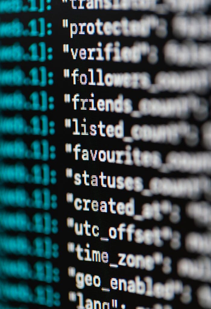 Extreme Close-up Photo of Codes on Screen